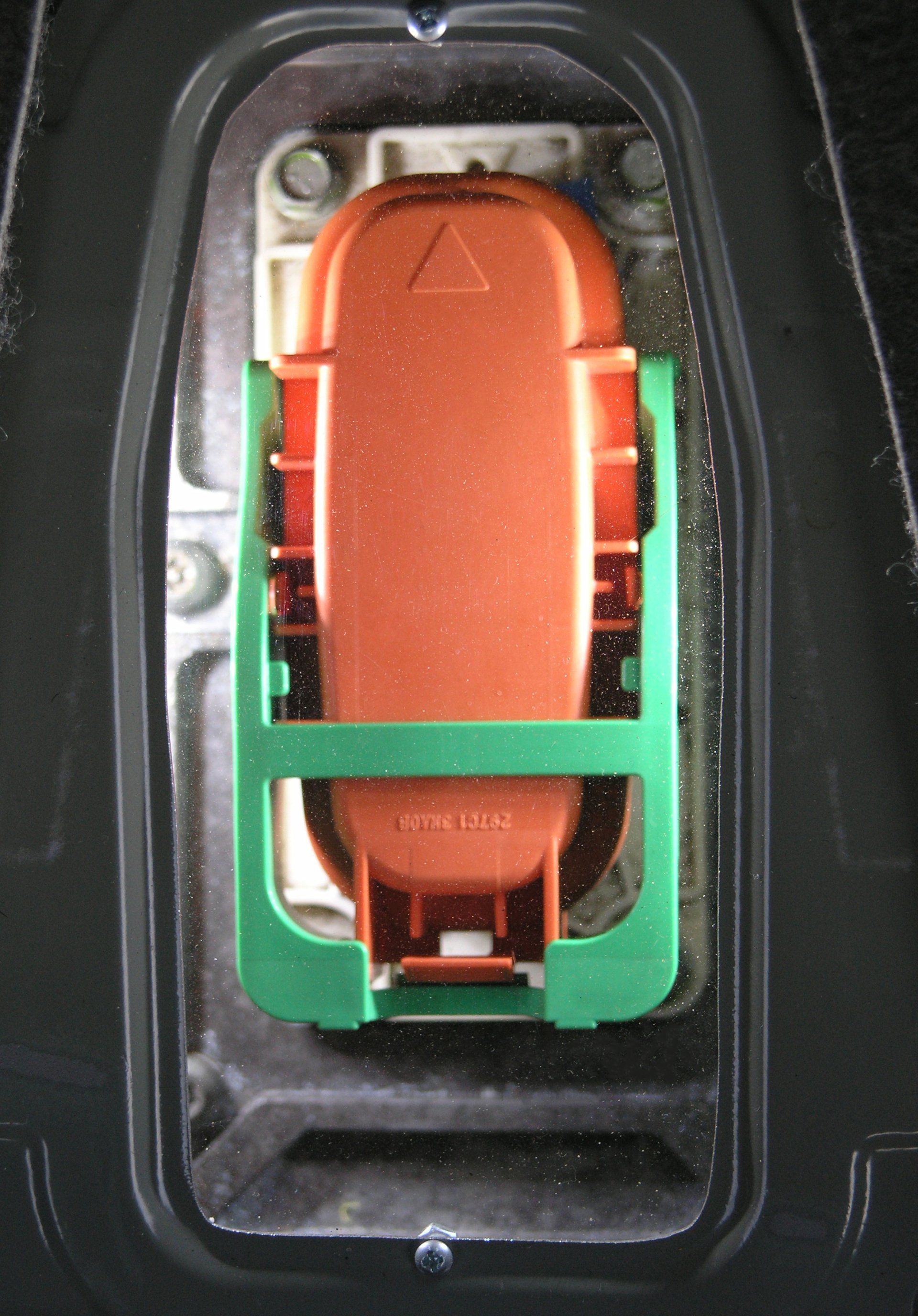 A green and orange object with the letter a on it