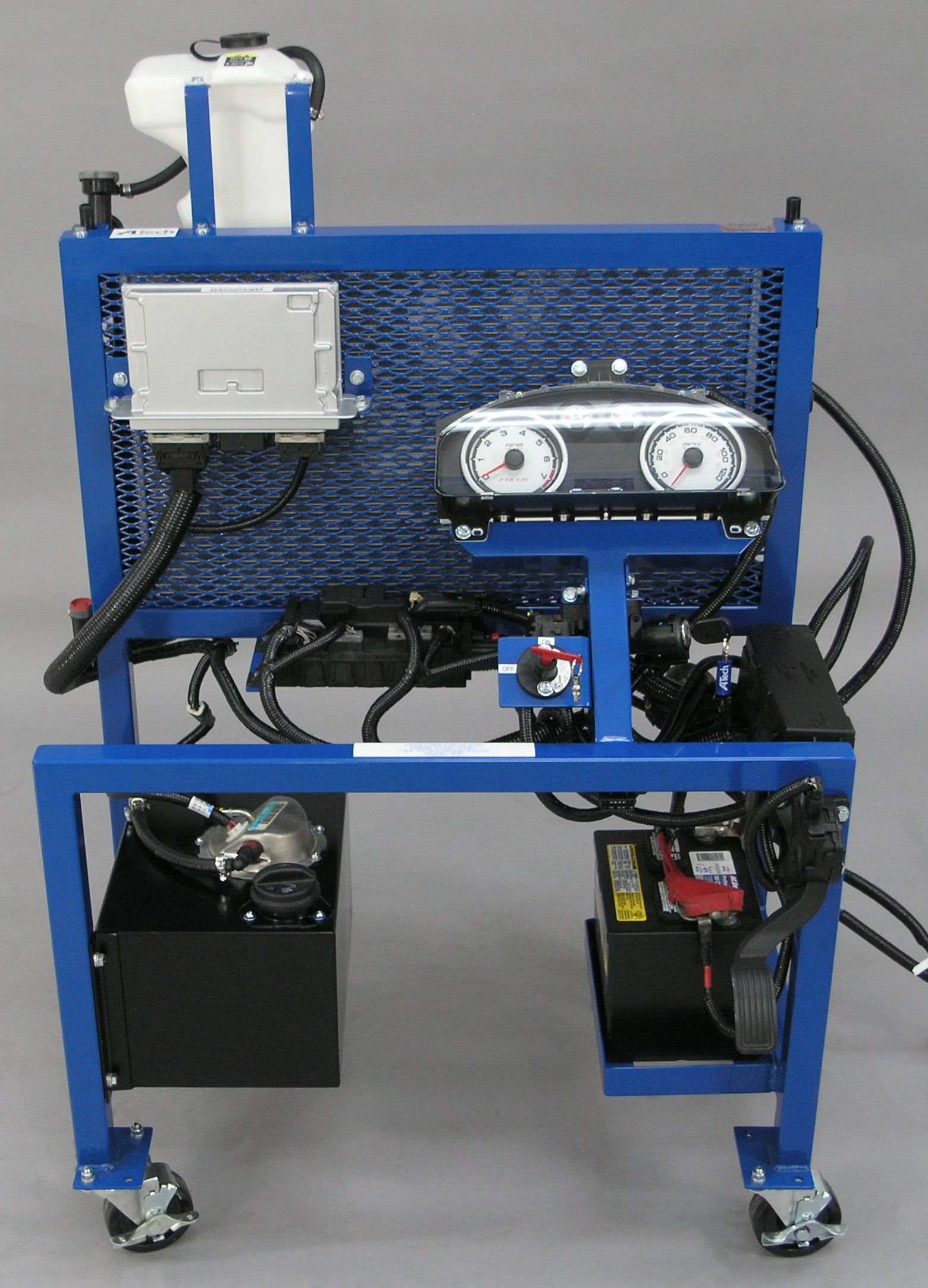 A blue cart with a bunch of wires on it
