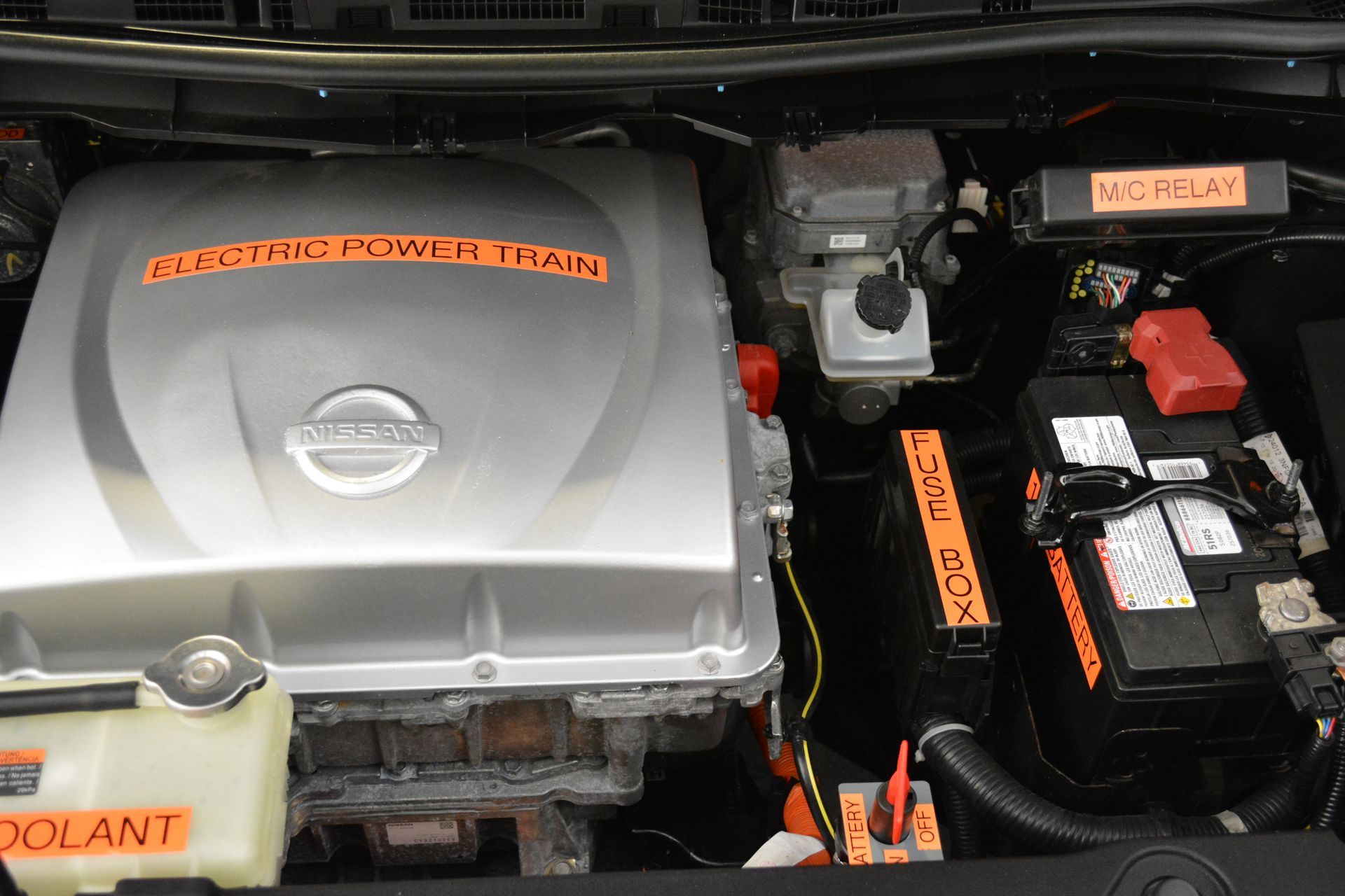 A close up of the engine of a nissan leaf