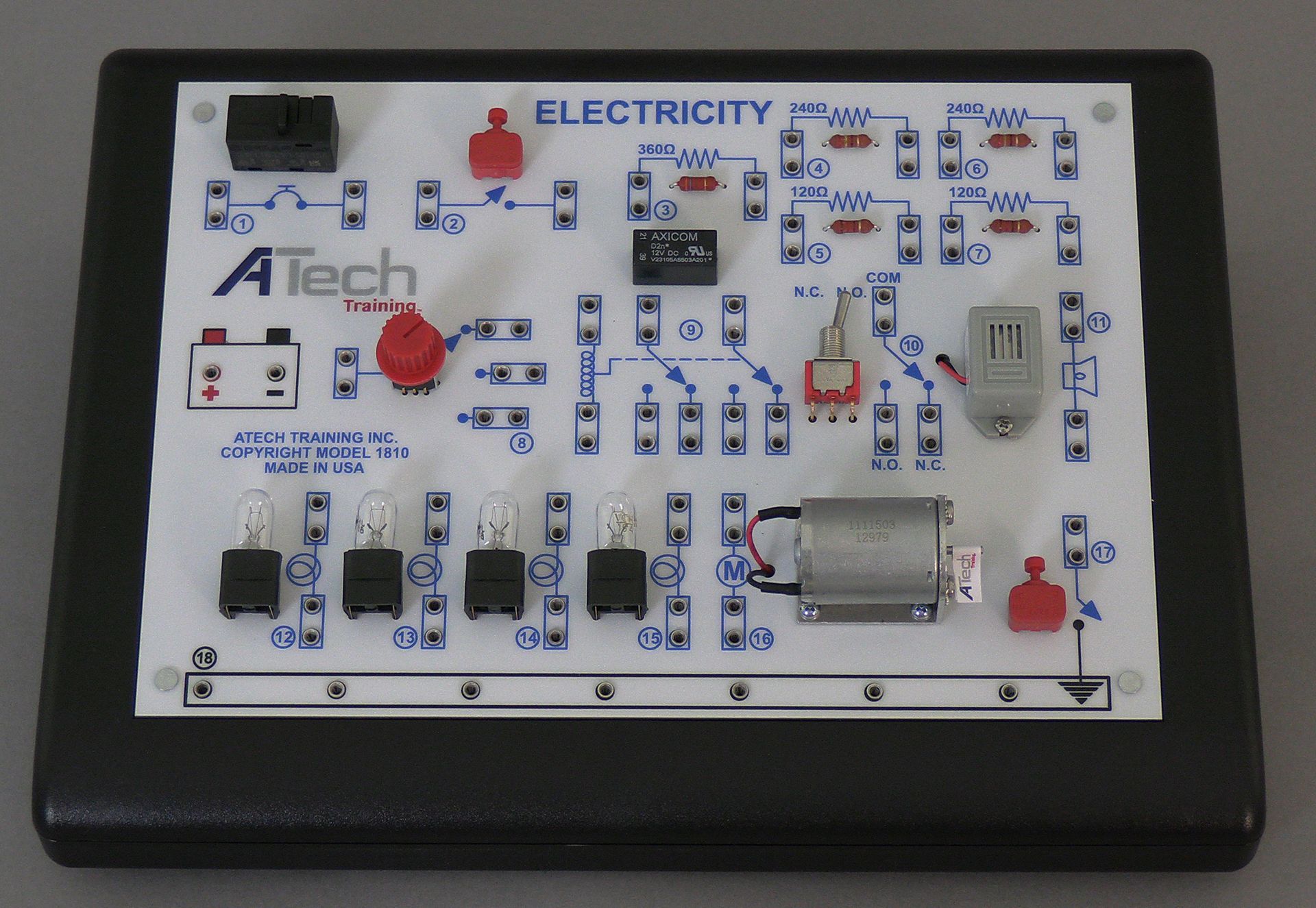 A black box with a white board that says electricity on it
