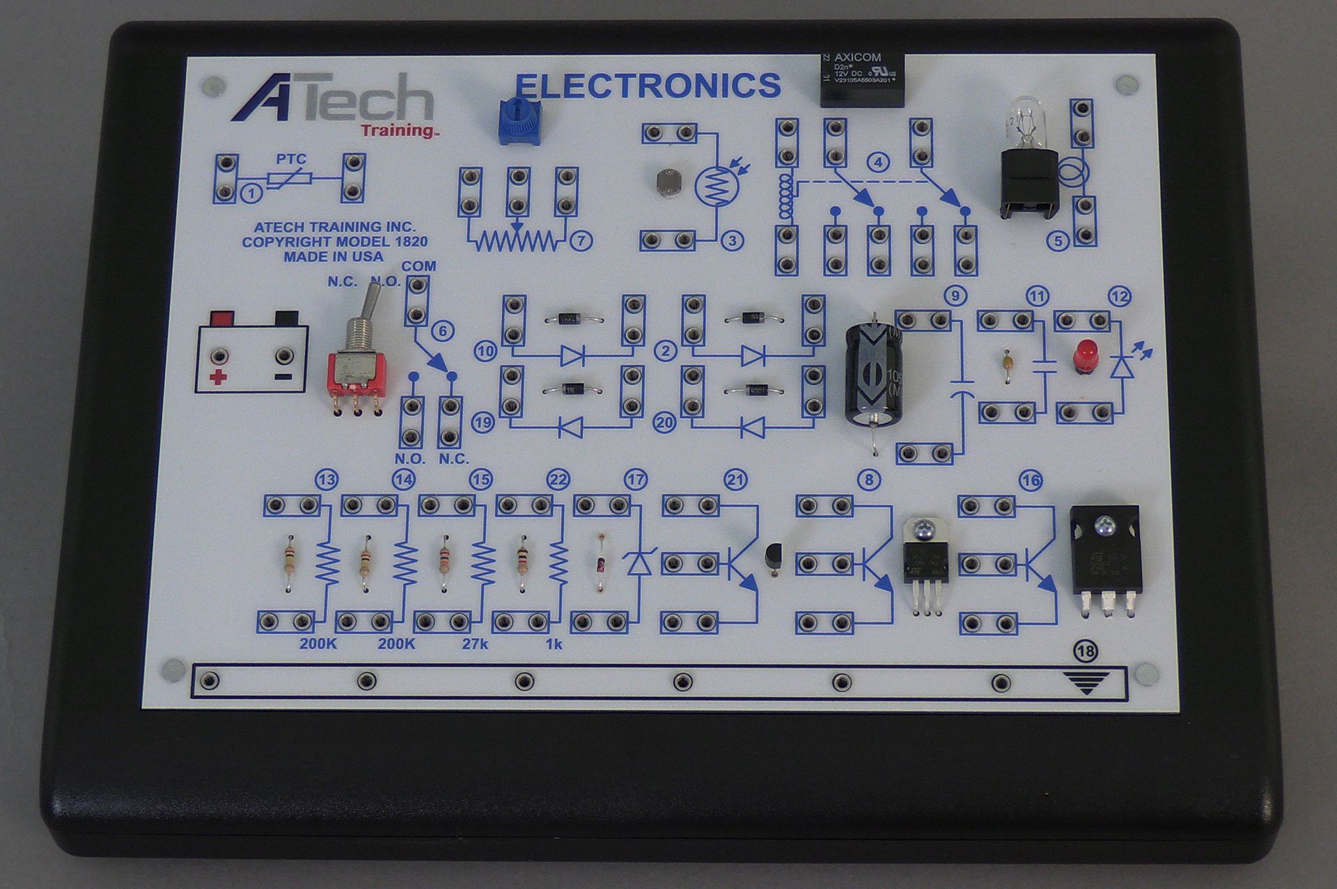 A tech electronic board with various electronic components on it