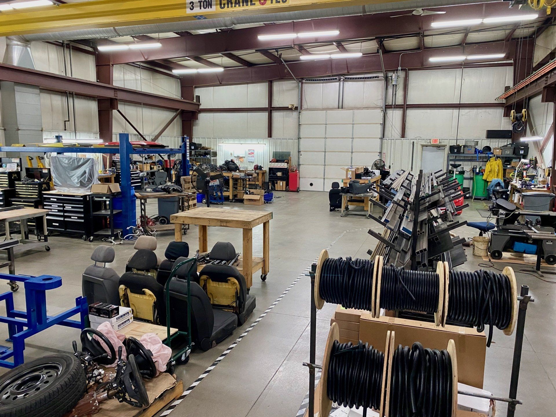 A large warehouse filled with lots of machinery and equipment.