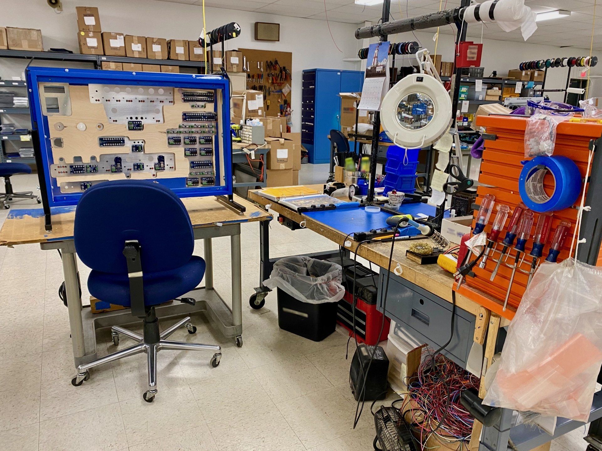 A room filled with lots of tools and a chair