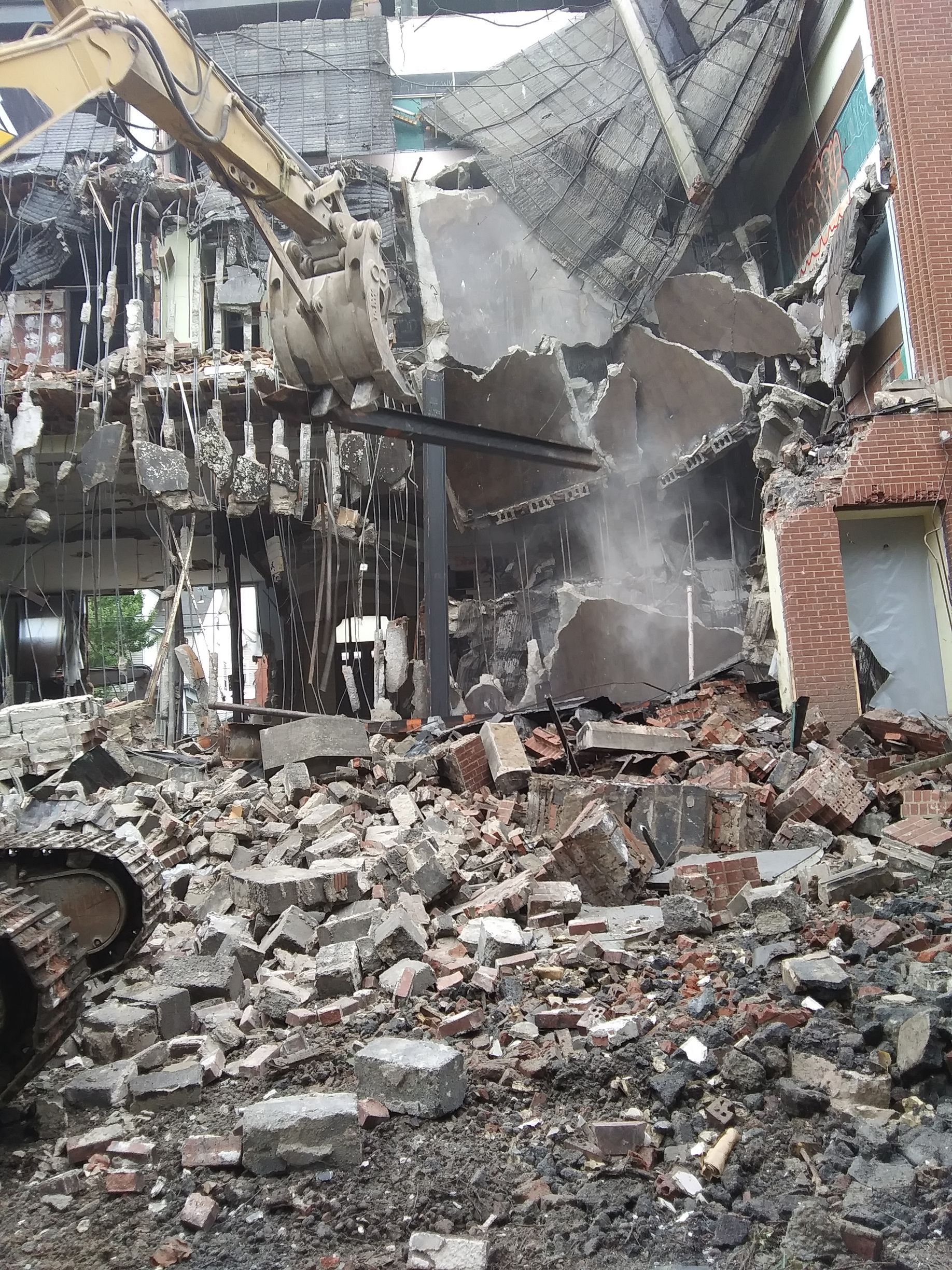 building being demolished after a fire
