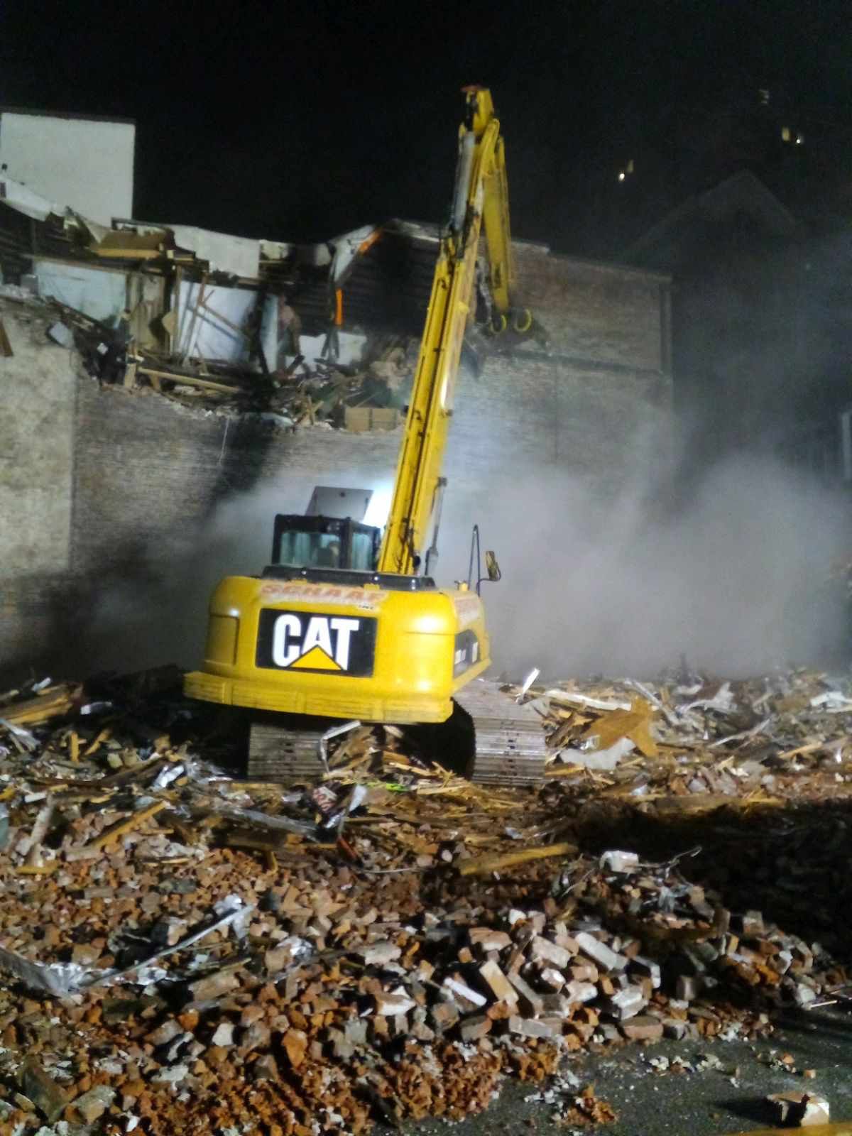 excavator working long into the night.