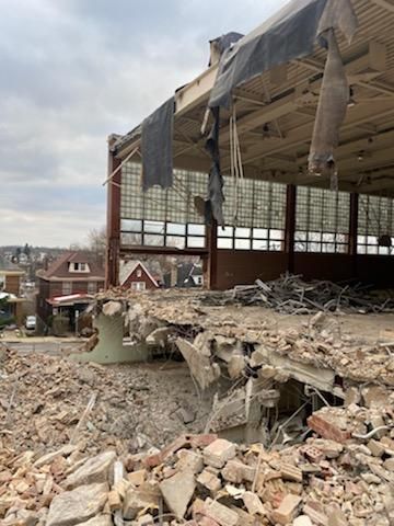 inside a warehouse that is being torn down by schaaf