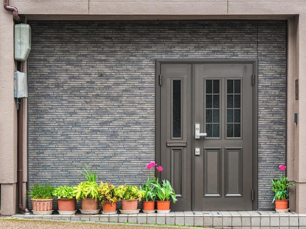 Gray Front Door Exterior — High-Quality Fibreglass Doors in Mackay, QLD
