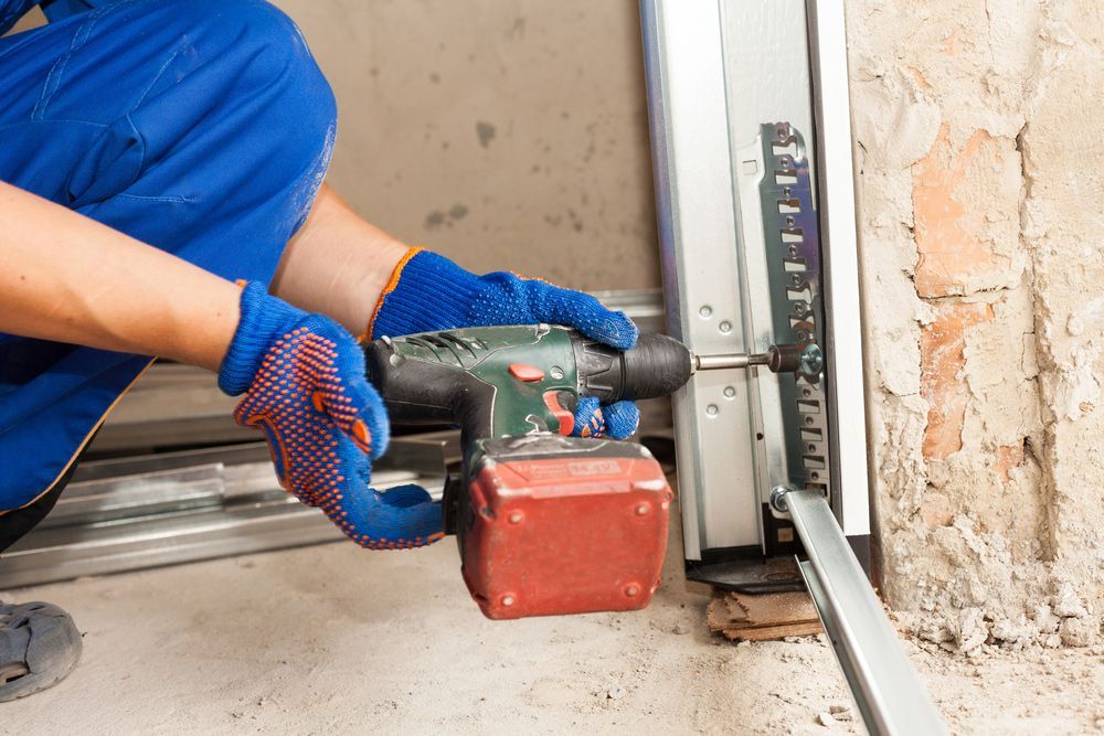 Handyman Repair The Door Lock In The Room — Internal, External & Garage Door Repairs in Mackay, QLD