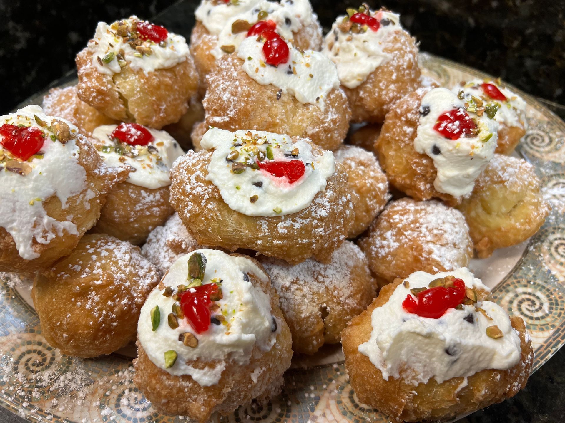 Italian cream pastries with powdered sugar at Edison Pizza in Edison NJ