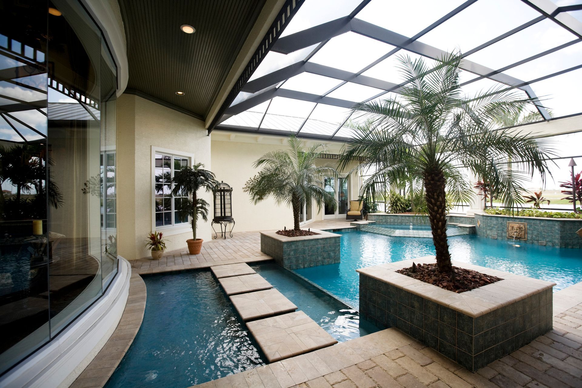 A Large Indoor Swimming Pool With A Clear Roof - Flagler County, FL - Screen Windows Painting Services A Large Indoor Swimming Pool With A Clear Roof - Flagler County, FL - Screen Windows Painting Services