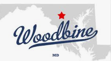 Woodbine MD logo with blue script text and a red star over a gray Maryland map
