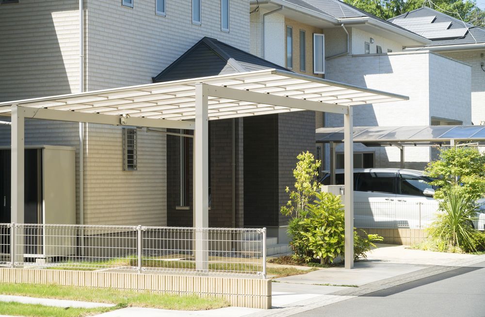 Carport Attached to a Light-Colored House