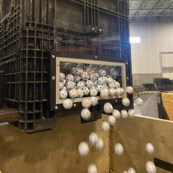 Side discharge hopper Side discharge hopper being emptied into a plastic container
