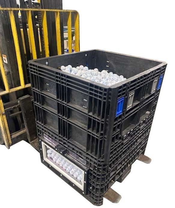 custom hopper container full of gulf balls