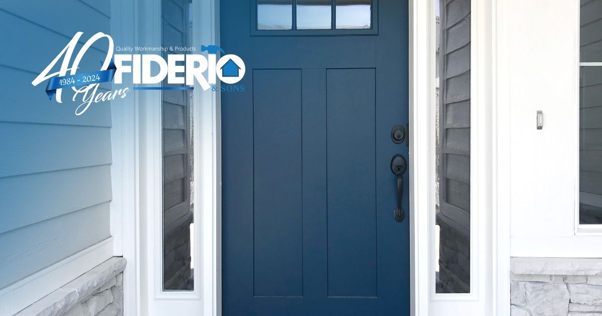 Blue front door with white trim and sidelights on a house exterior
