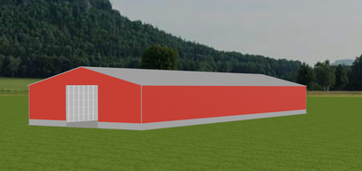 A long, red rectangular agricultural building with a grey roof and white doors, situated in a green, grassy field.