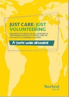 Yellow poster reading “Just Care: Just Volunteering” with a world map and Tearfund logo.