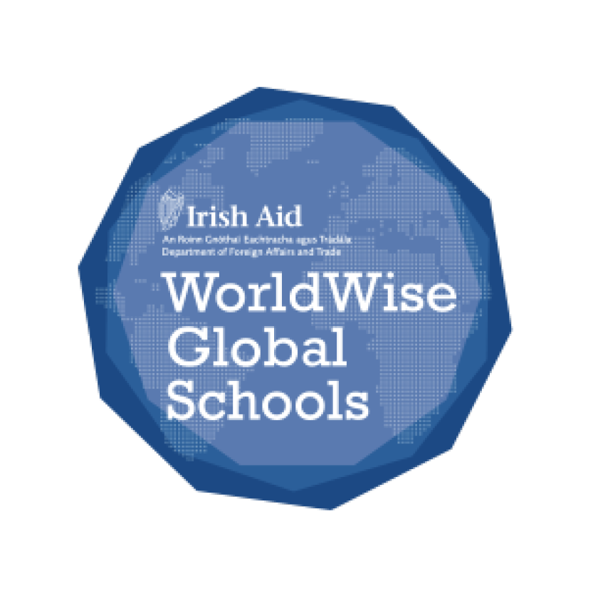 Blue Irish Aid WorldWise Global Schools logo with white text in a faceted circle