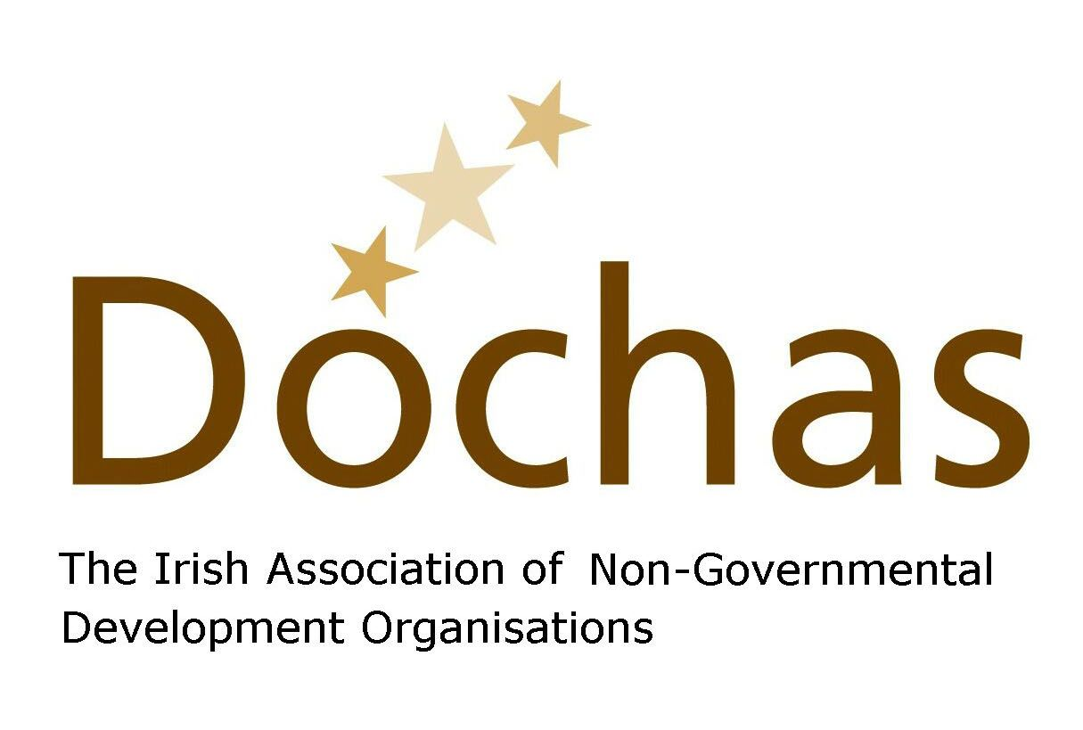 Dochas logo with gold stars and brown text reading “Dochas” and “The Irish Association of Non-Governmental Development Organisations”