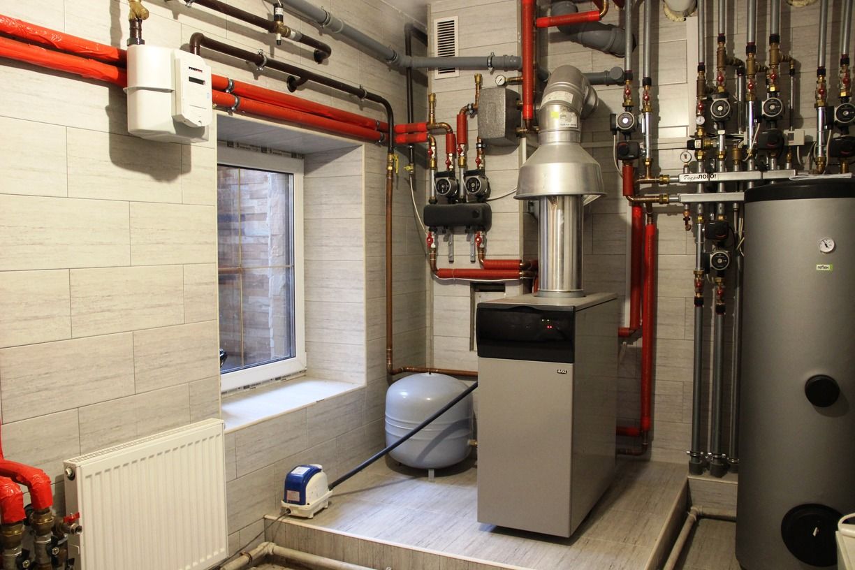 There is a boiler in the middle of the room.