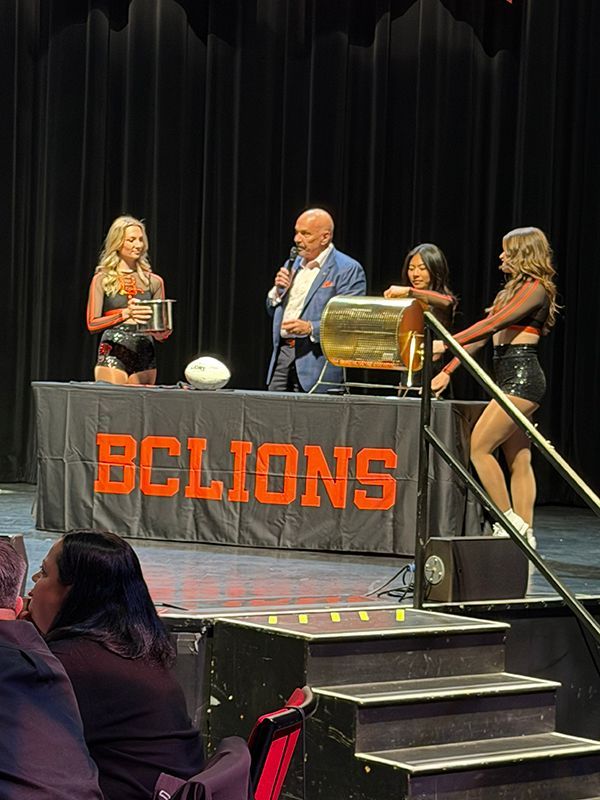 George Chayka of BC Lions draws draft pick for their player lottery.