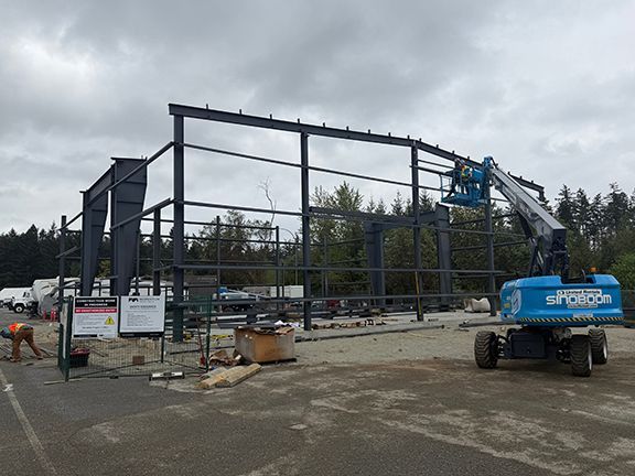 Steel I-beams are supported with girls to create strength for wall systems