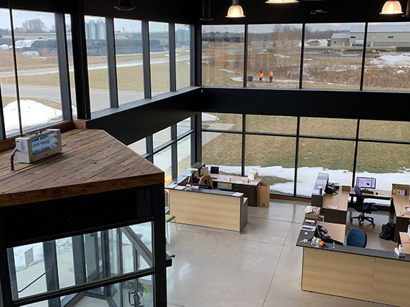Plenty of glass allows natural light into the building lobby.