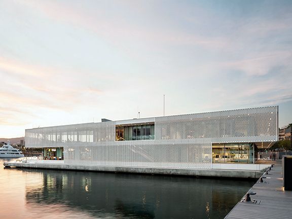 Steel facades create a modern, sophisticated look for marina buildings.