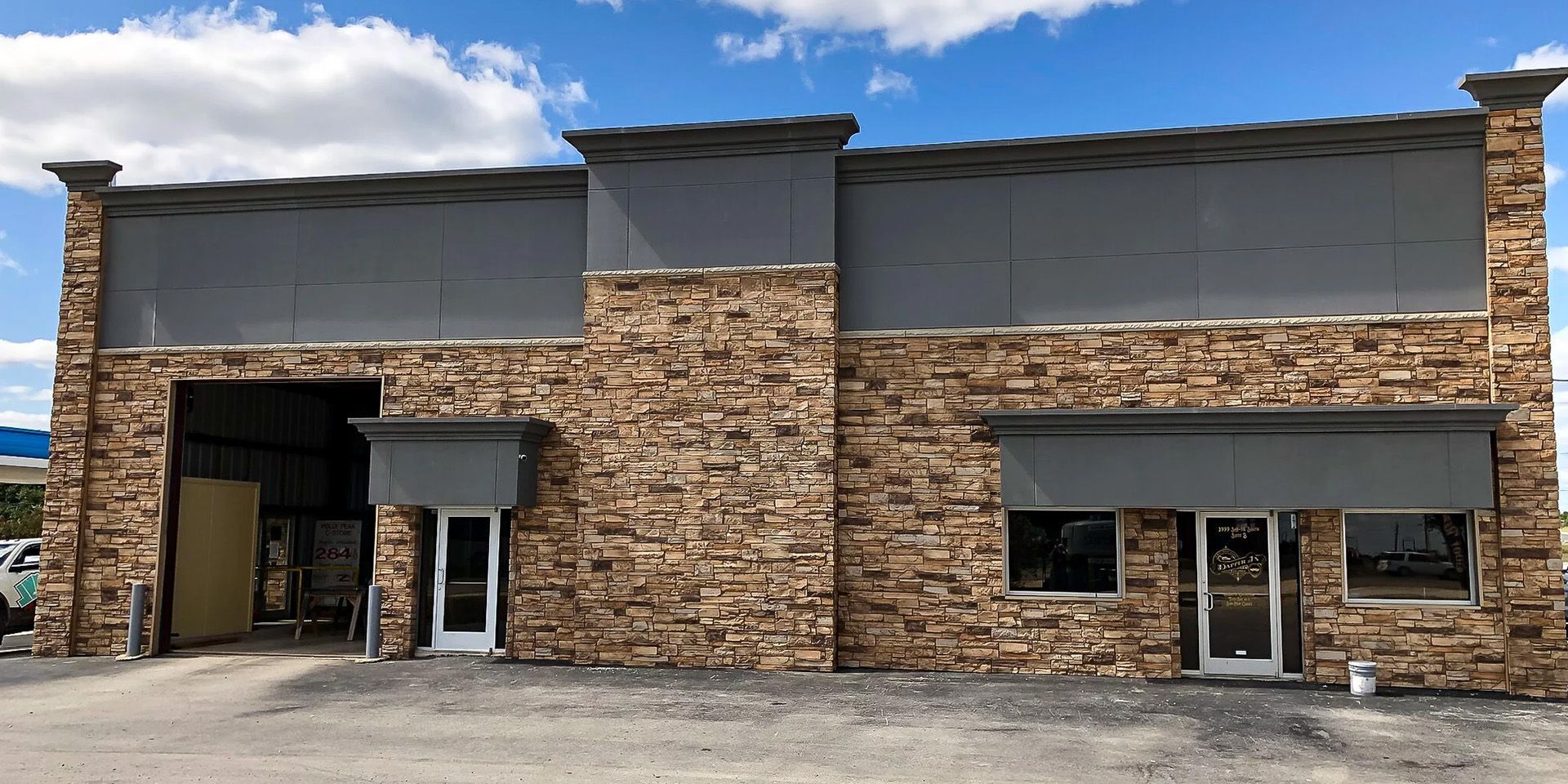 Pre-engineered metal buildings can use any exterior finish, including stone and wood.