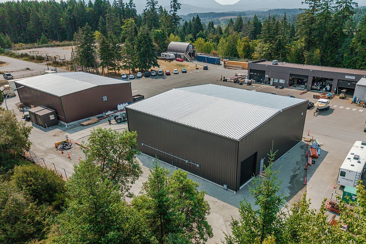Two buildings completed by Summit Steel Buildings in photo taken from drone