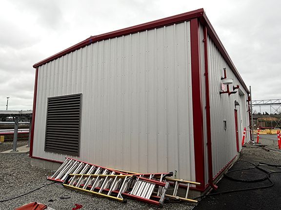 Side view of YVR airport jet fuel pump facility after completion.