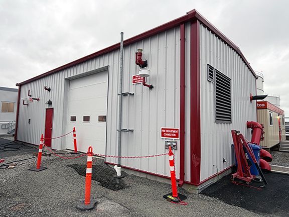 Completed jet fuel pump building by Summit Steel Buildings at Vancouver's YVR airport.
