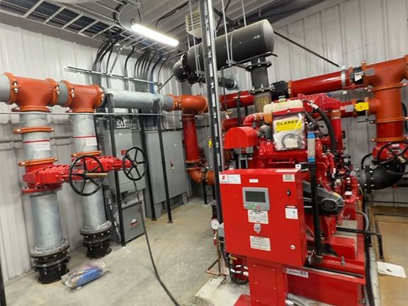 Interior look at jet fuel pump equipment at YVR building construction.
