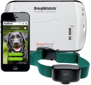 A blue gps dog fence is sitting next to a cell phone.