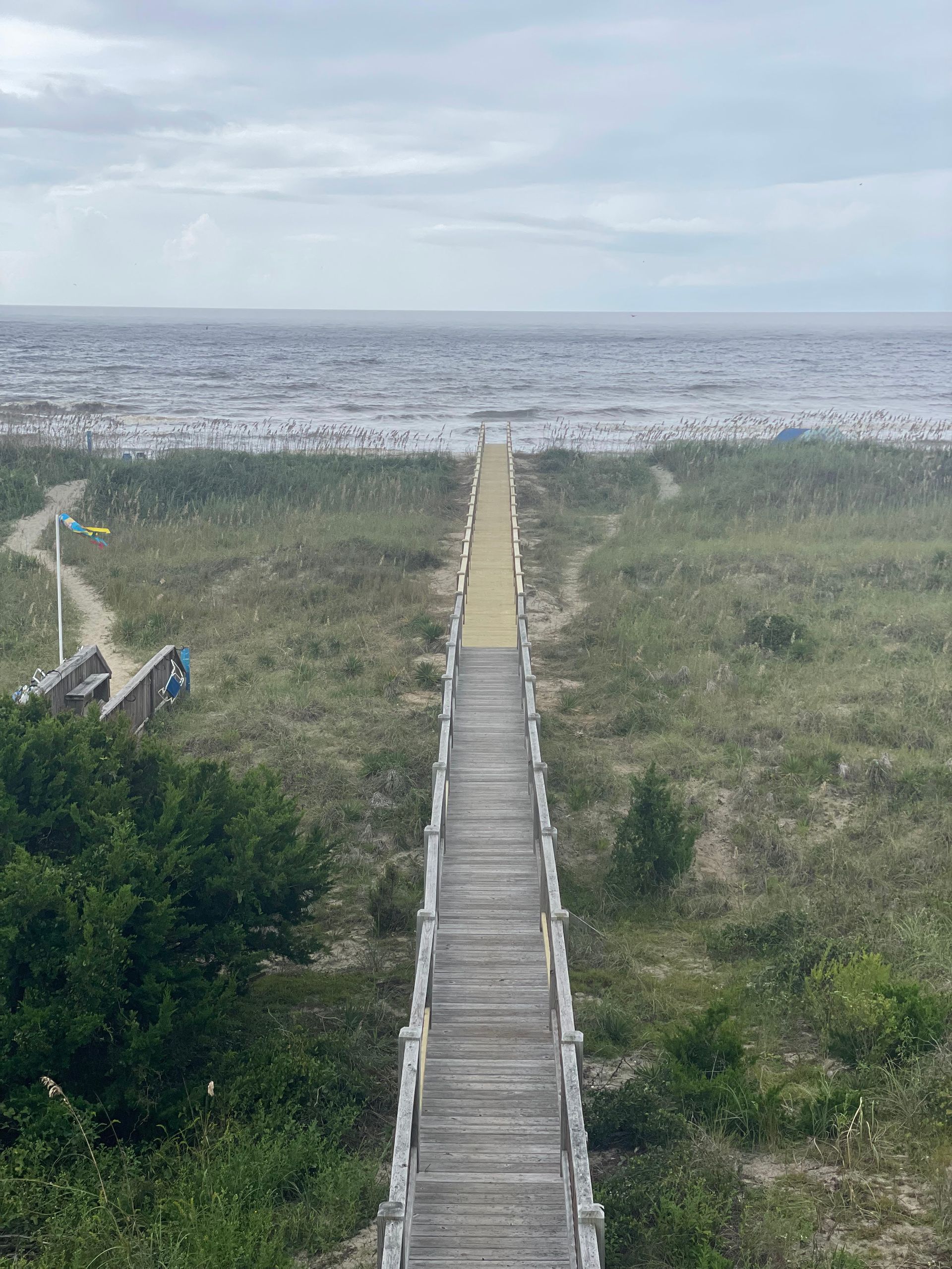 Wooden Boardwalk Leading To The Beach