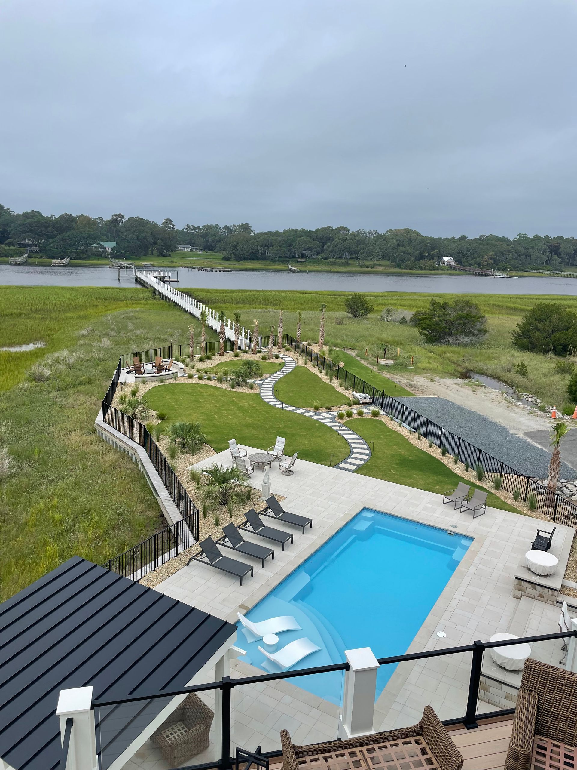 Backyard Pool With Dock And Scenic View