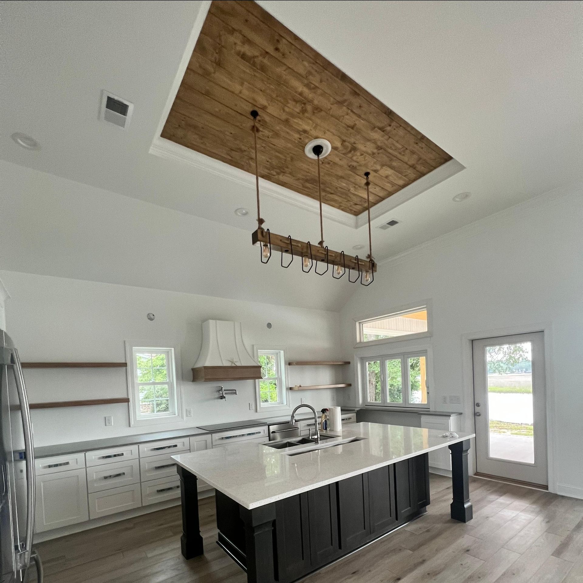 Modern Kitchen With Wooden Ceiling Accent