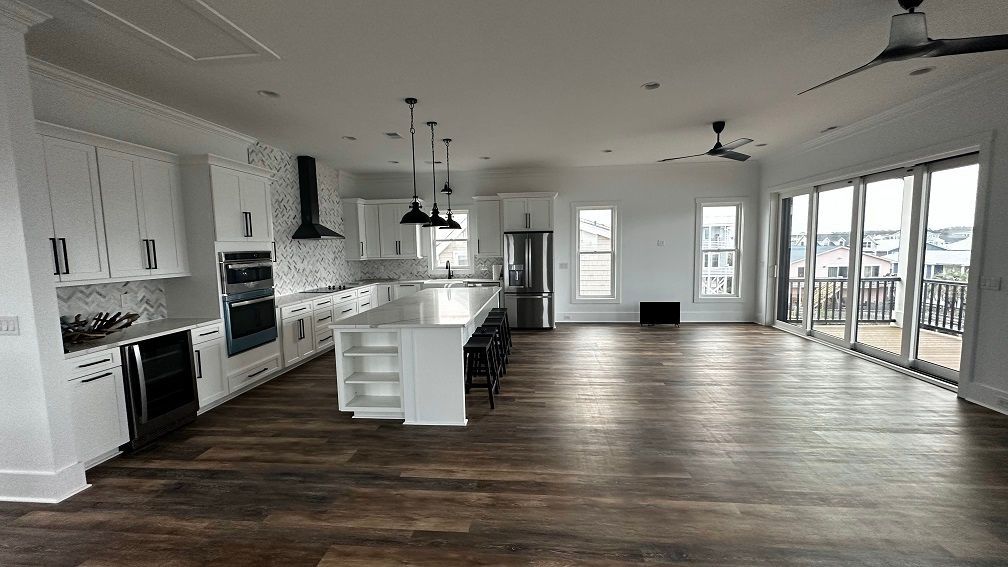 Open Kitchen And Living Area With Island