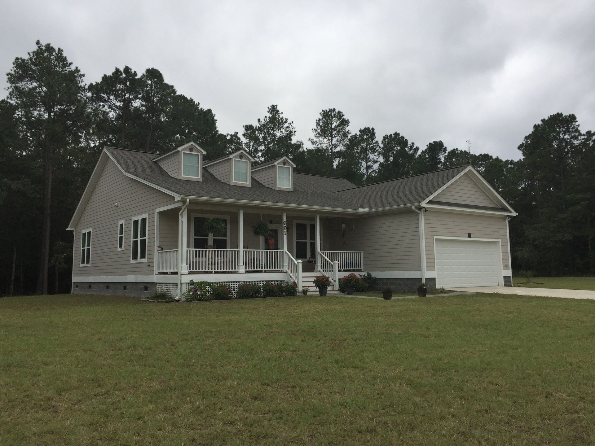 Cozy Home With Front Porch And Garage