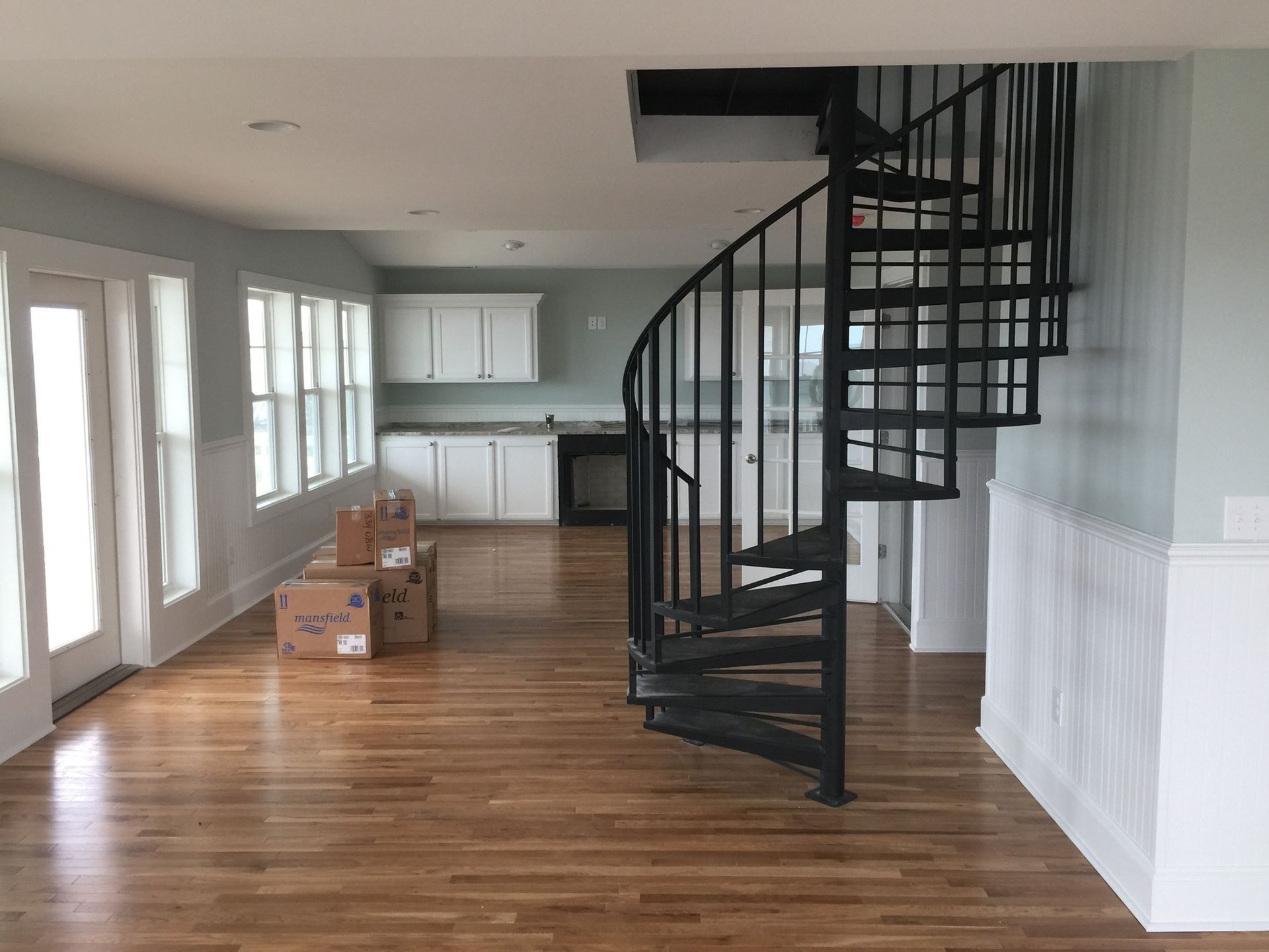 Living Room With Spiral Staircase