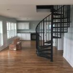 Spacious Room With Spiral Staircase