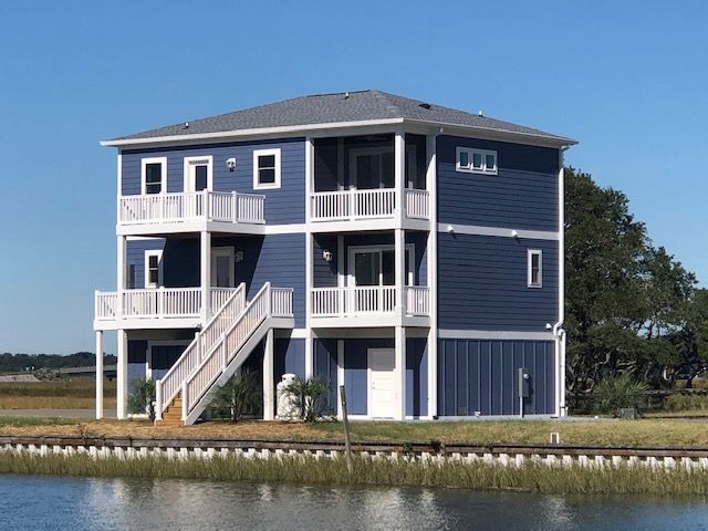 Renovated beachfront house with balconies