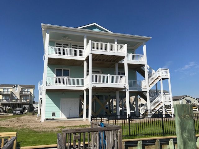 Renovated beachfront home with multiple decks