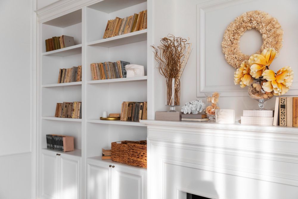There is a table and chairs in the middle of the room.