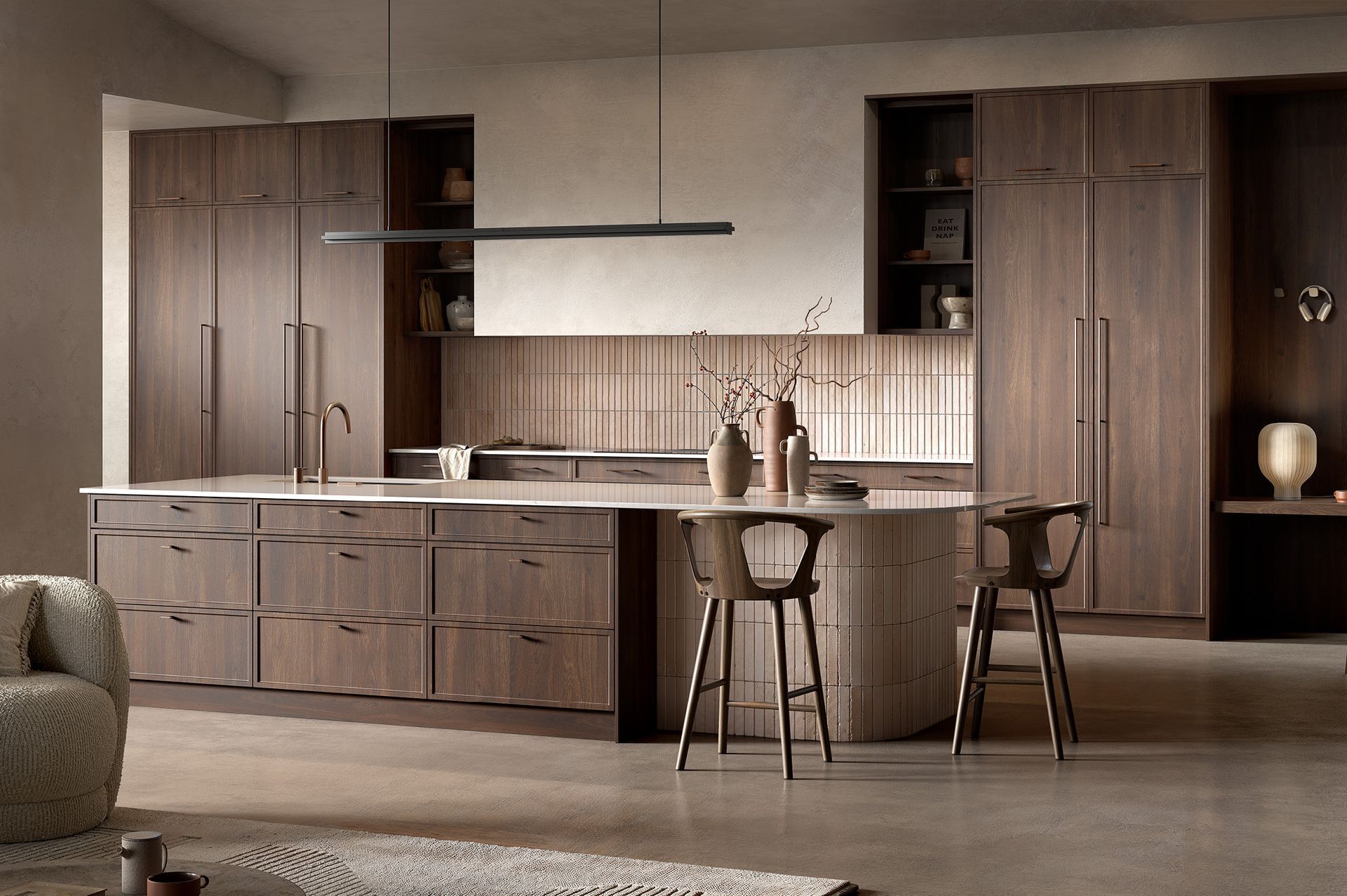 A kitchen with white cabinets and black counter tops