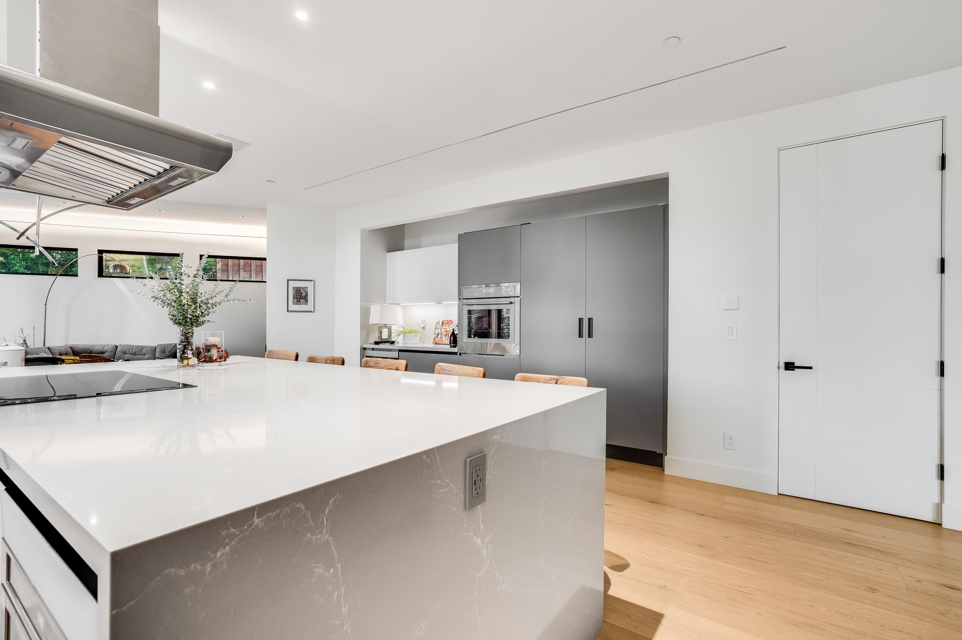 There is a large island in the middle of the kitchen.