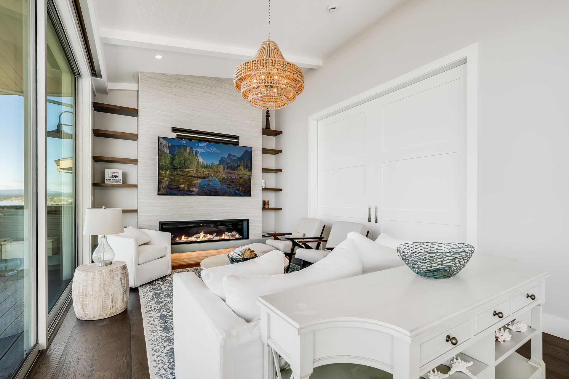 A living room filled with furniture and a fireplace.