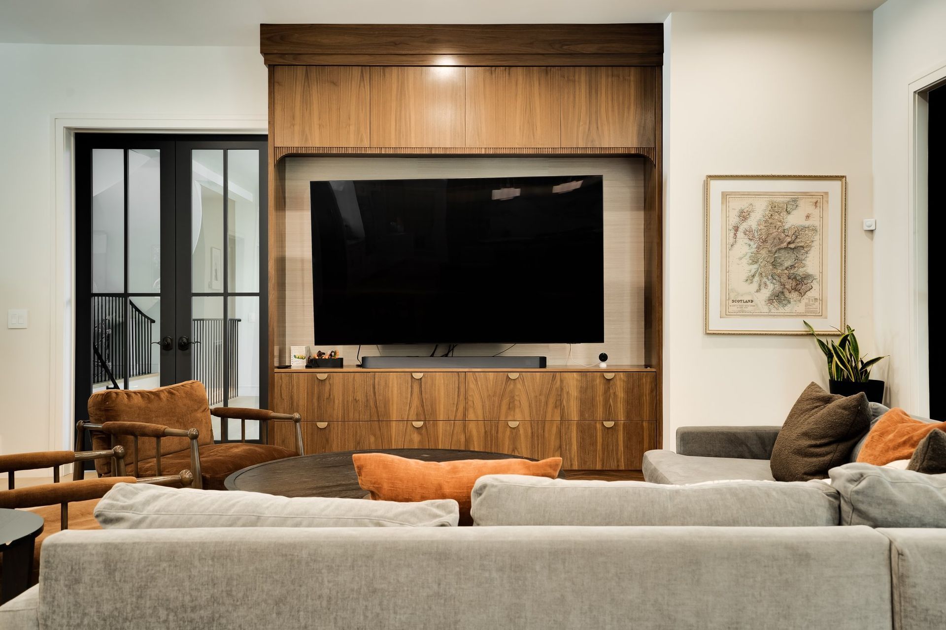 Walnut built-in living room cabinetry at Douglass Lane in Saratoga