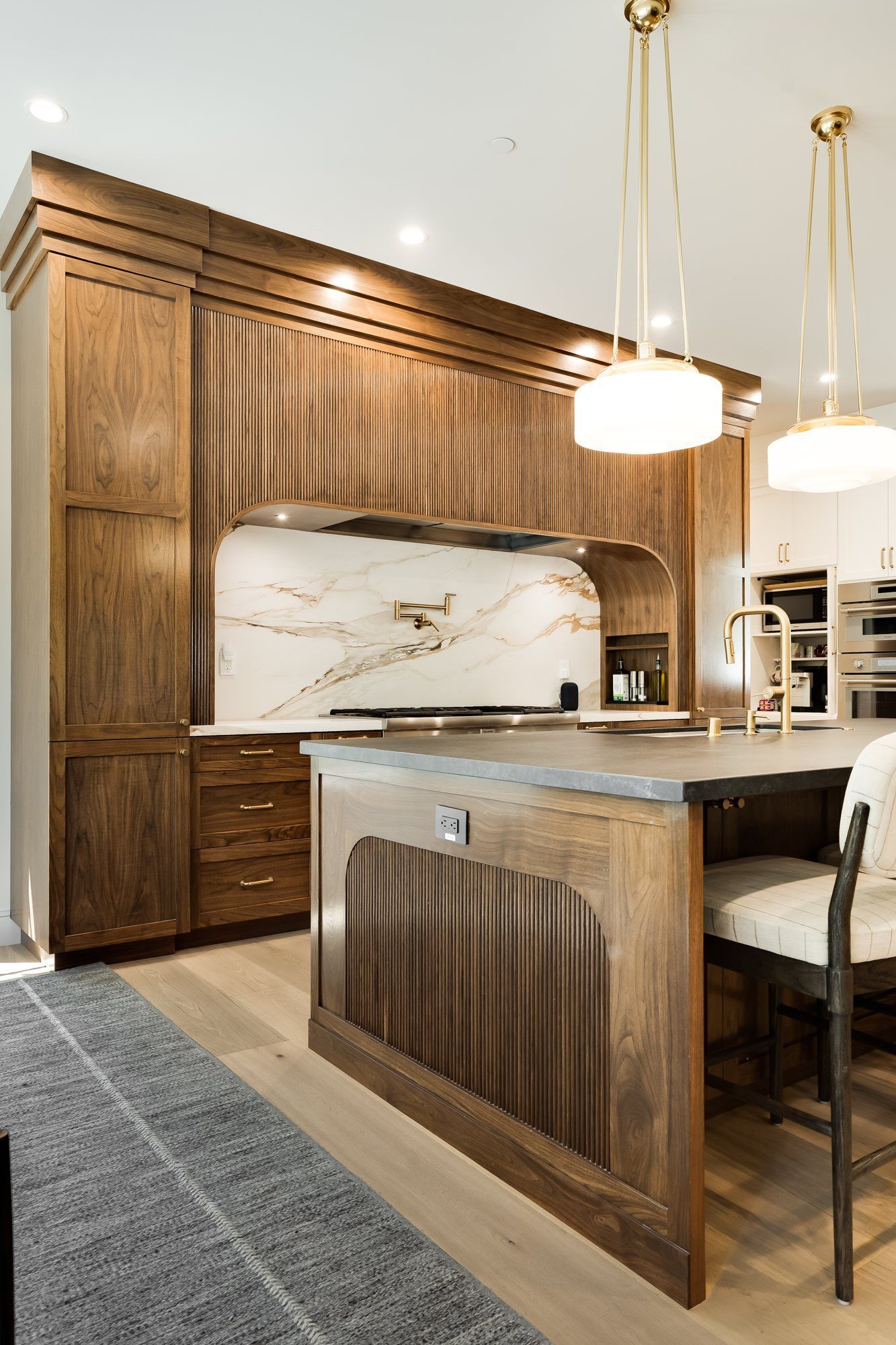 Walnut tambour detailing on the custom kitchen island