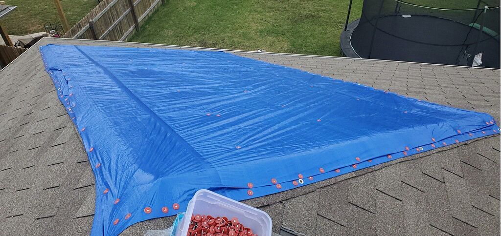 Emergency Roof Tarps by Austin Roofing and Construction